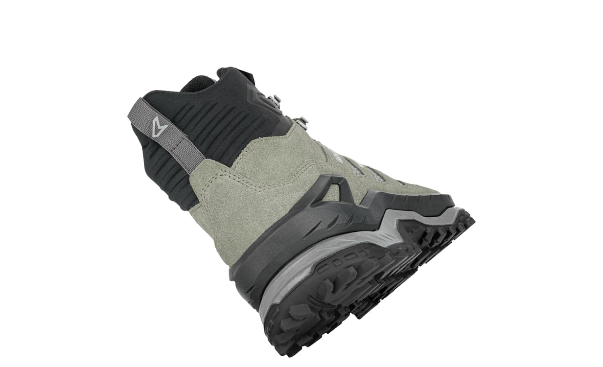 angled back view of mid height sage green hiking boot on white background