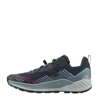 A single athletic trail running shoe shown in a side profile view against a solid white background. The shoe features a dark navy upper with light gray overlays, a white midsole, and magenta and gray geometric stripe accents on the side.