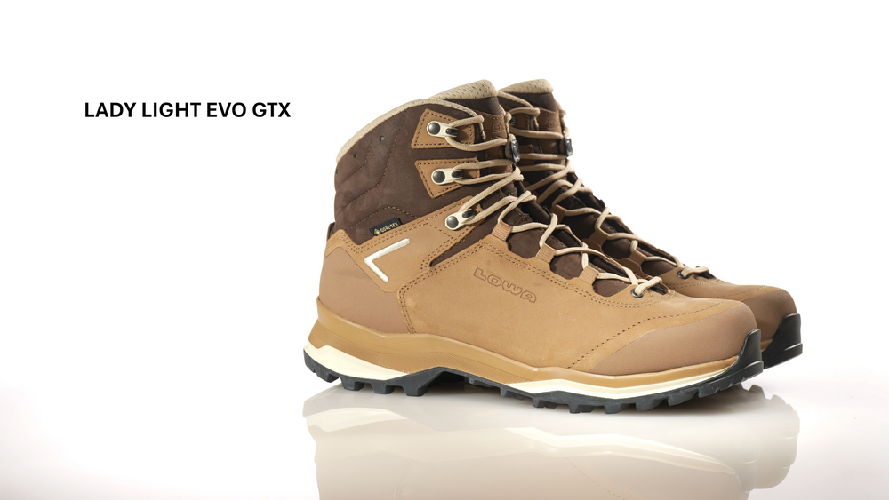 Video of a LOWA Lady Light EVO GTX — women's lightweight hiking boot. Nubuck leather upper, GORE-TEX waterproof-breathable lining, contrast midsole, lugged rubber outsole, hook-and-eyelet lacing. Pair shown in three-quarter front view