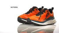 Video showing the SKYTERRA trail running shoe, featuring supercritical foam cushioning and a Vibram Megagrip outsole with 4.5mm lugs